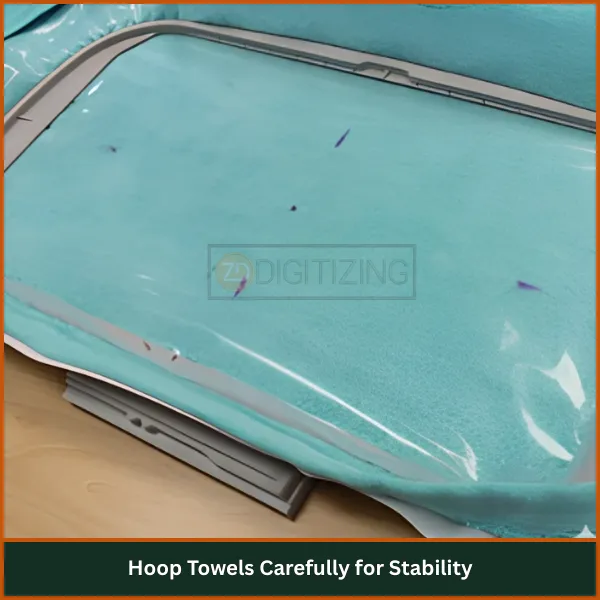 Hoop Towels Carefully for Stability